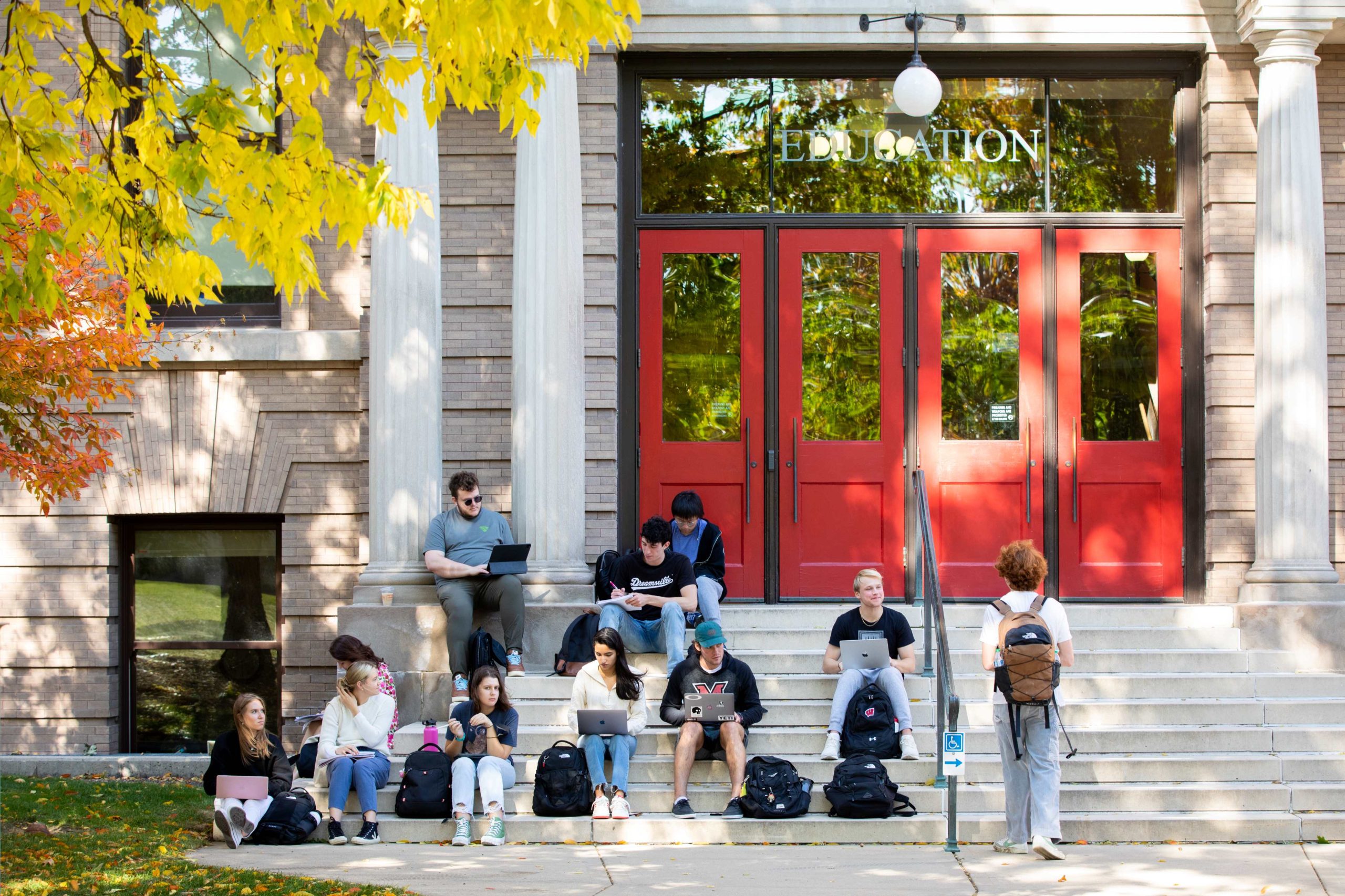 Students Studying Outside the Education Building
