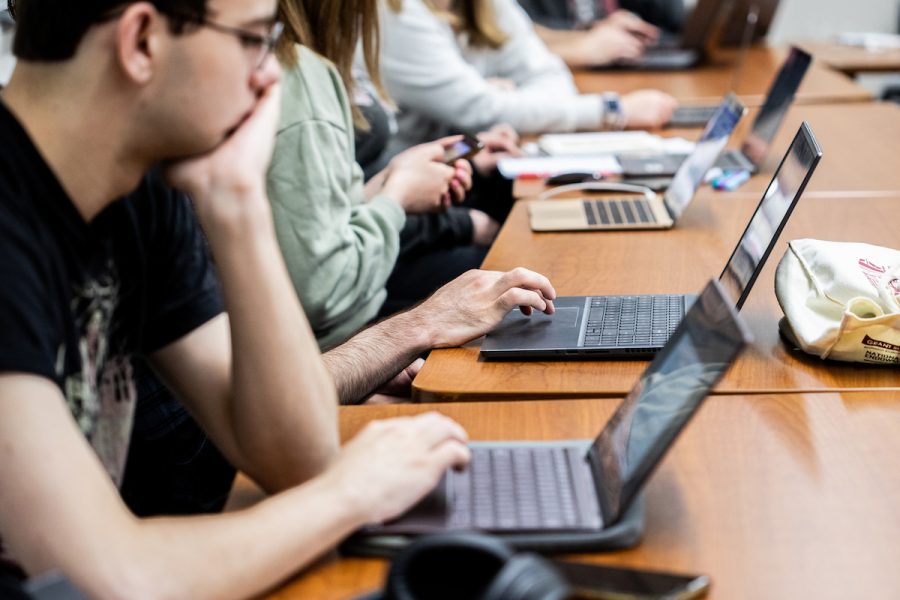 students on laptops