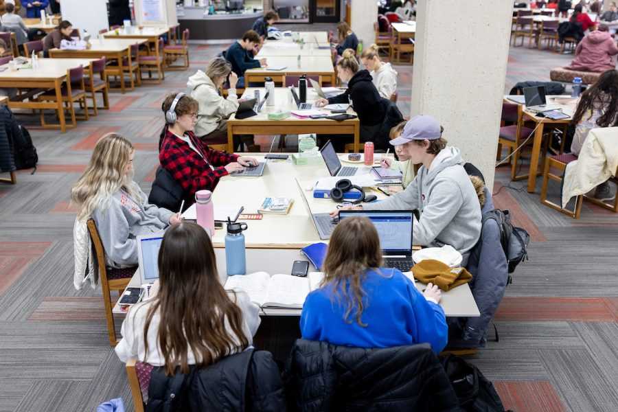 a group of students working at a large table